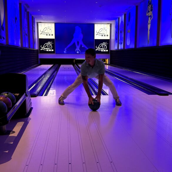 Guest bowling at Lovers Lane, the four-lane bowling alley at Sandals Royal Barbados