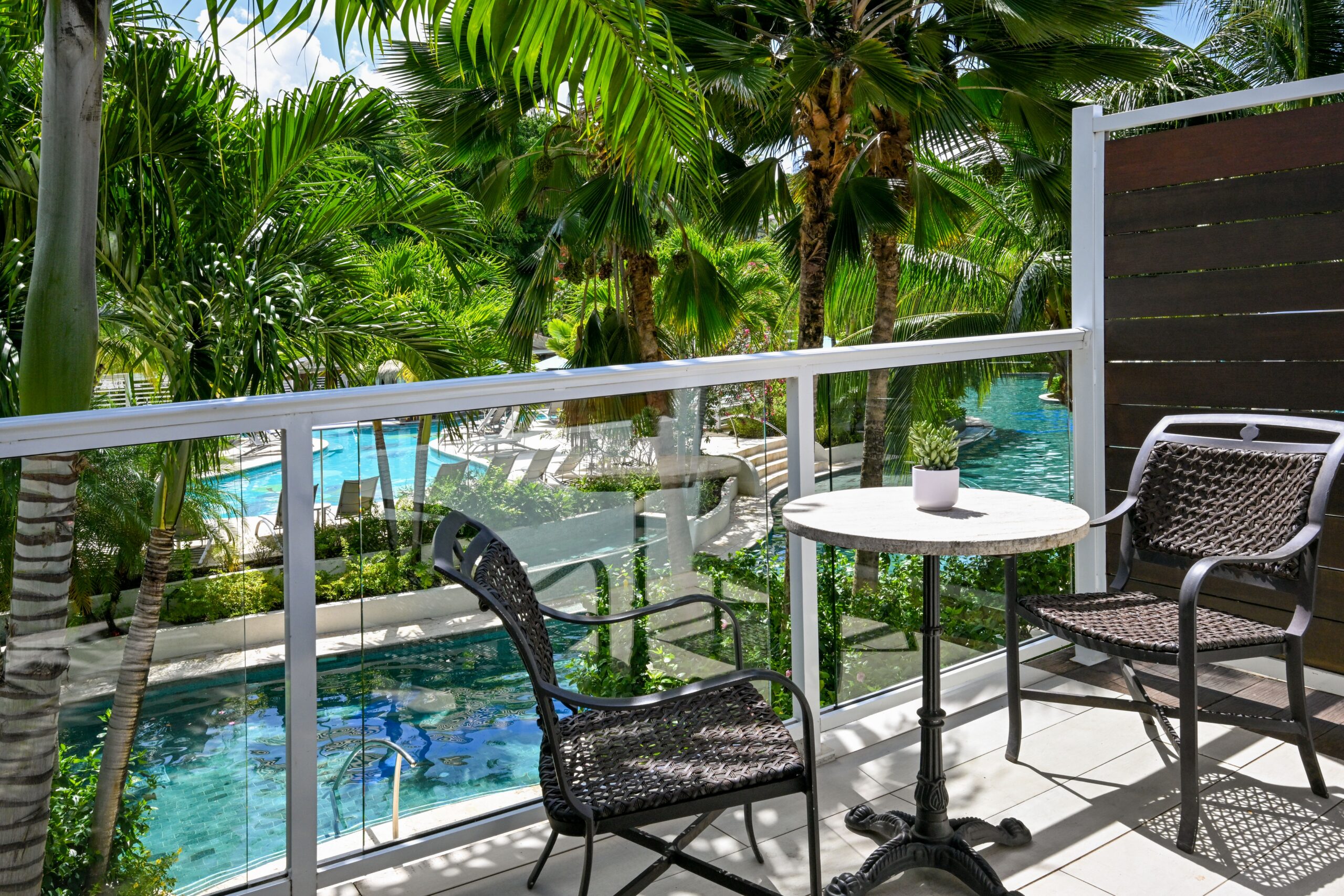 Crystal Lagoon Poolside Luxury room with balcony over the pool at Sandals Halcyon Beach, a last-minute all-inclusive discount in St. Lucia