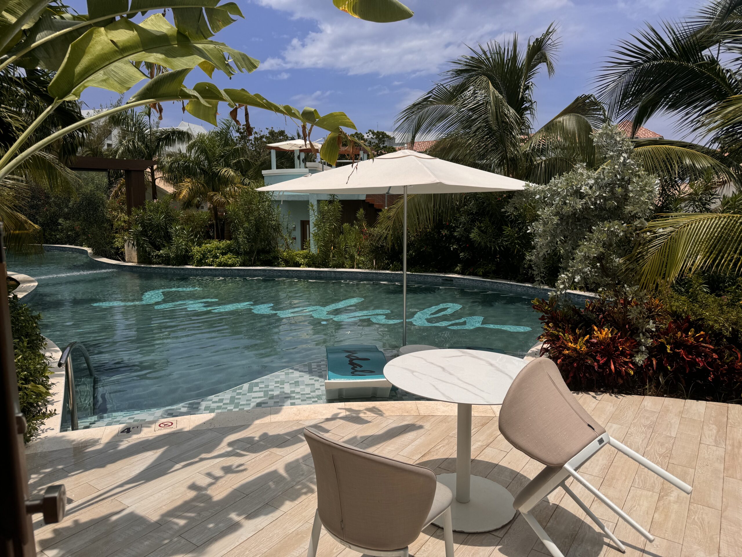Private pool with in-water loungers and water features at the Coyaba Sky Villa Rondoval Butler Suite (SKYV) at Sandals Dunn's River