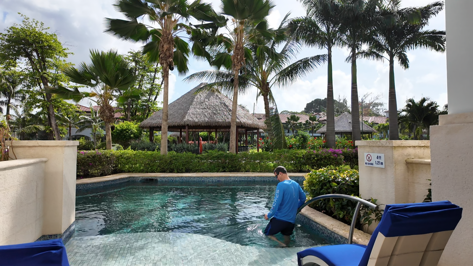 Sandals Royal Barbados Crystal Lagoon Swim-Up Butler Suite patio with soaking tub, lounge chairs, and pool access