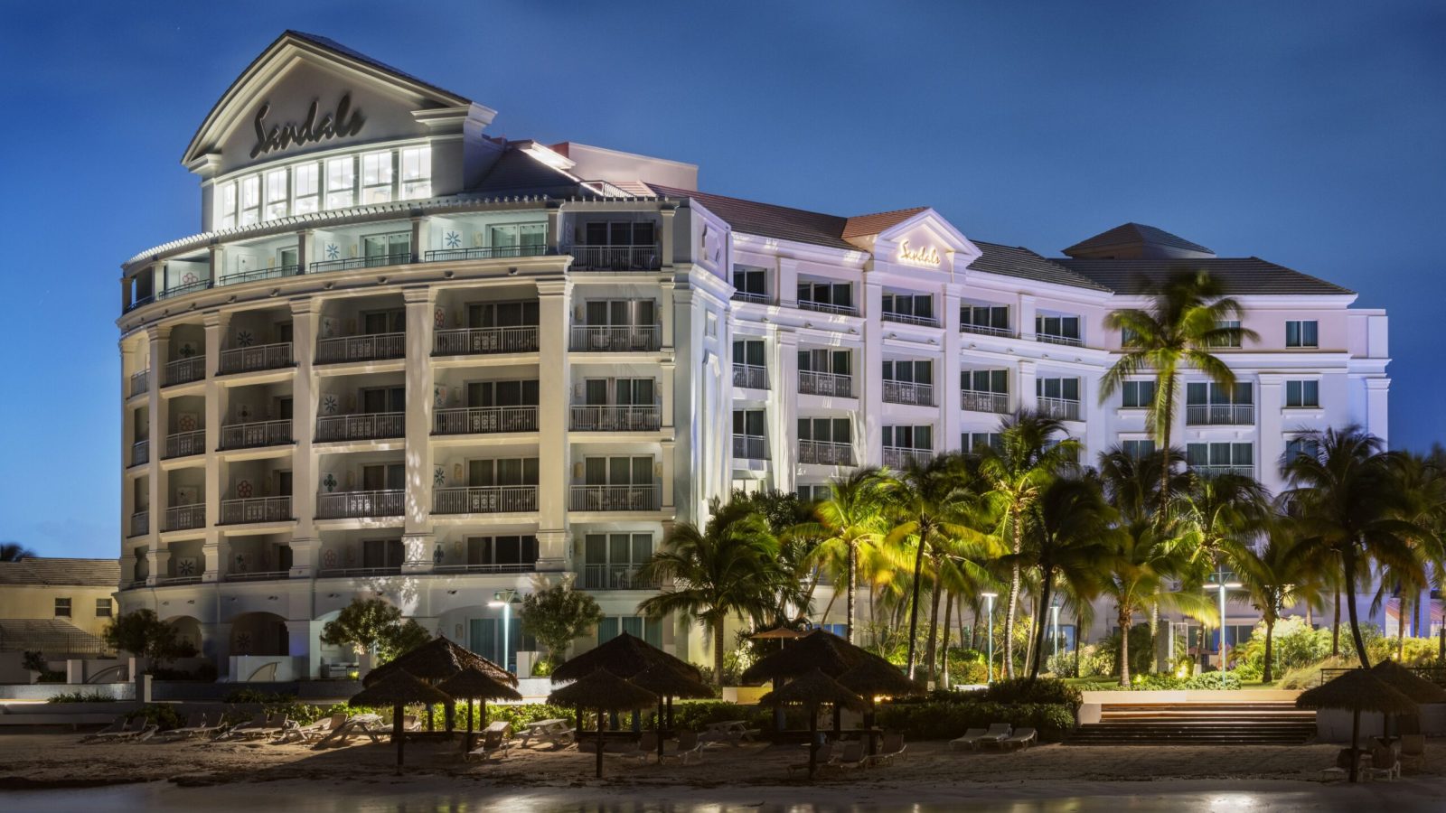 Sandals Royal Bahamian Balmoral East Bay building at night where HC club level rooms are located