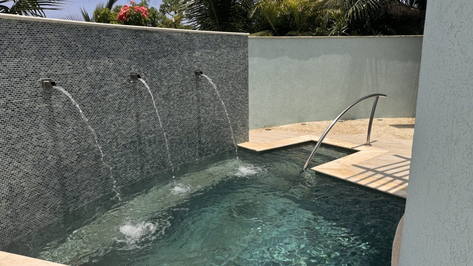 Water features along the private pool of the Coyaba Sky Villa Rondoval Butler Suite (SKYV) at Sandals Dunn's River