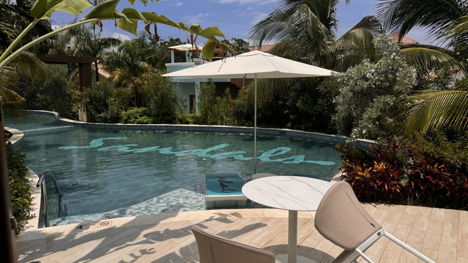 Private pool with in-water loungers and water features at the Coyaba Sky Villa Rondoval Butler Suite (SKYV) at Sandals Dunn's River