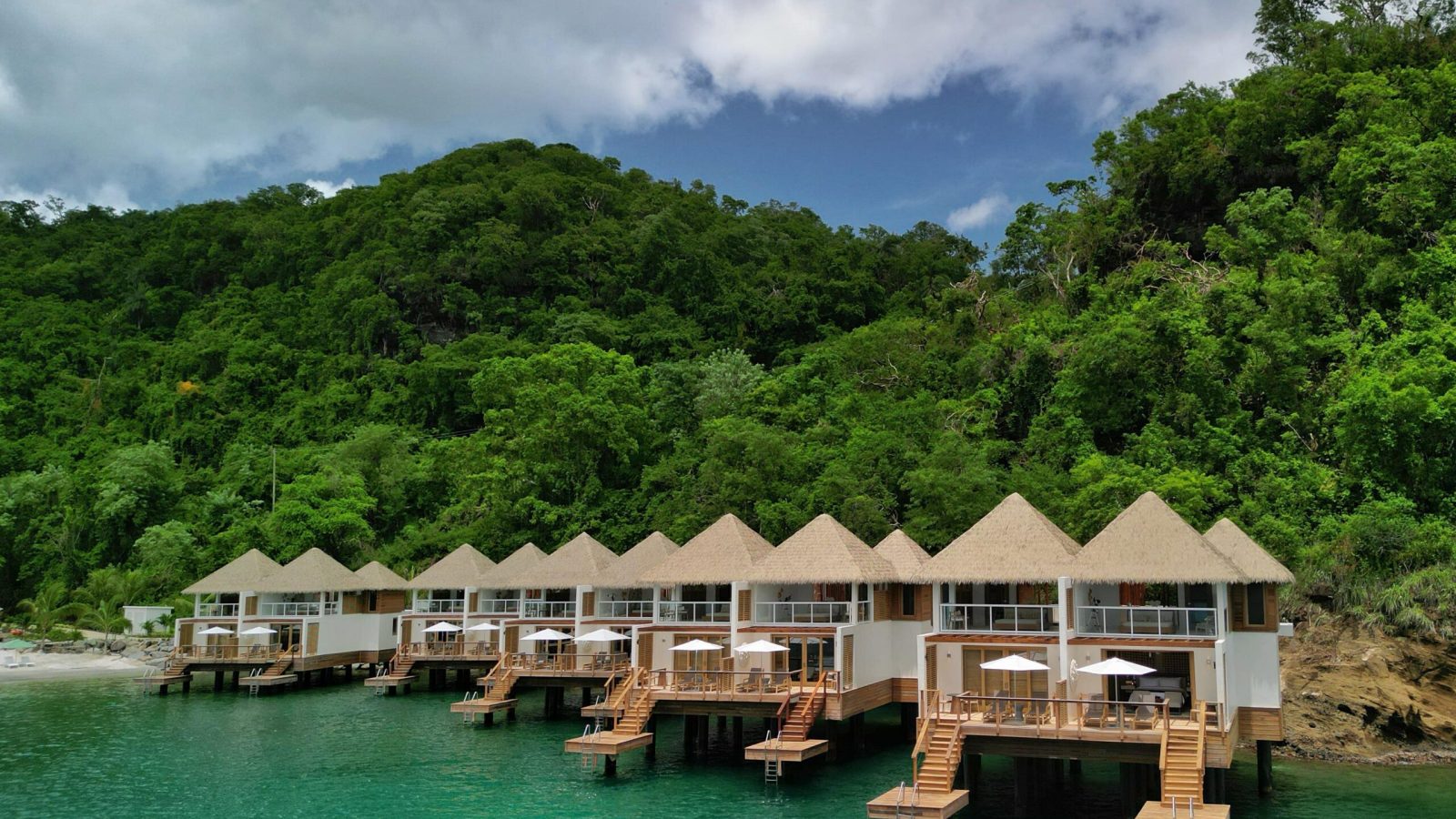Two-story Sandals overwater bungalows in the private cove at Sandals Saint Vincent, the subject of our overwater pricing analysis