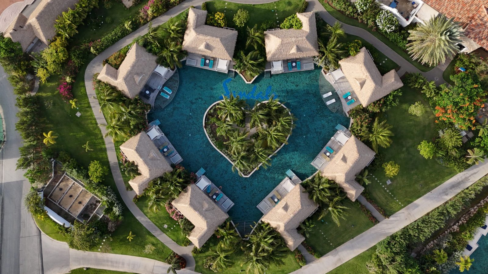 Sandals Royal Curaçao Kurason Island Poolside Butler Bungalow with heart-shaped pool and patio